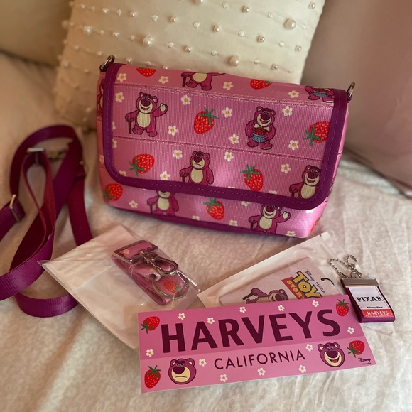 Harveys Handbags - Disney Harveys Lotso Berry Foldover Crossbody Bag with Click n Go Keychain